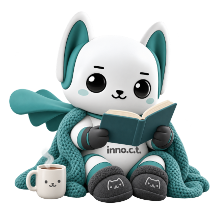 Tino reading a book under a blanket