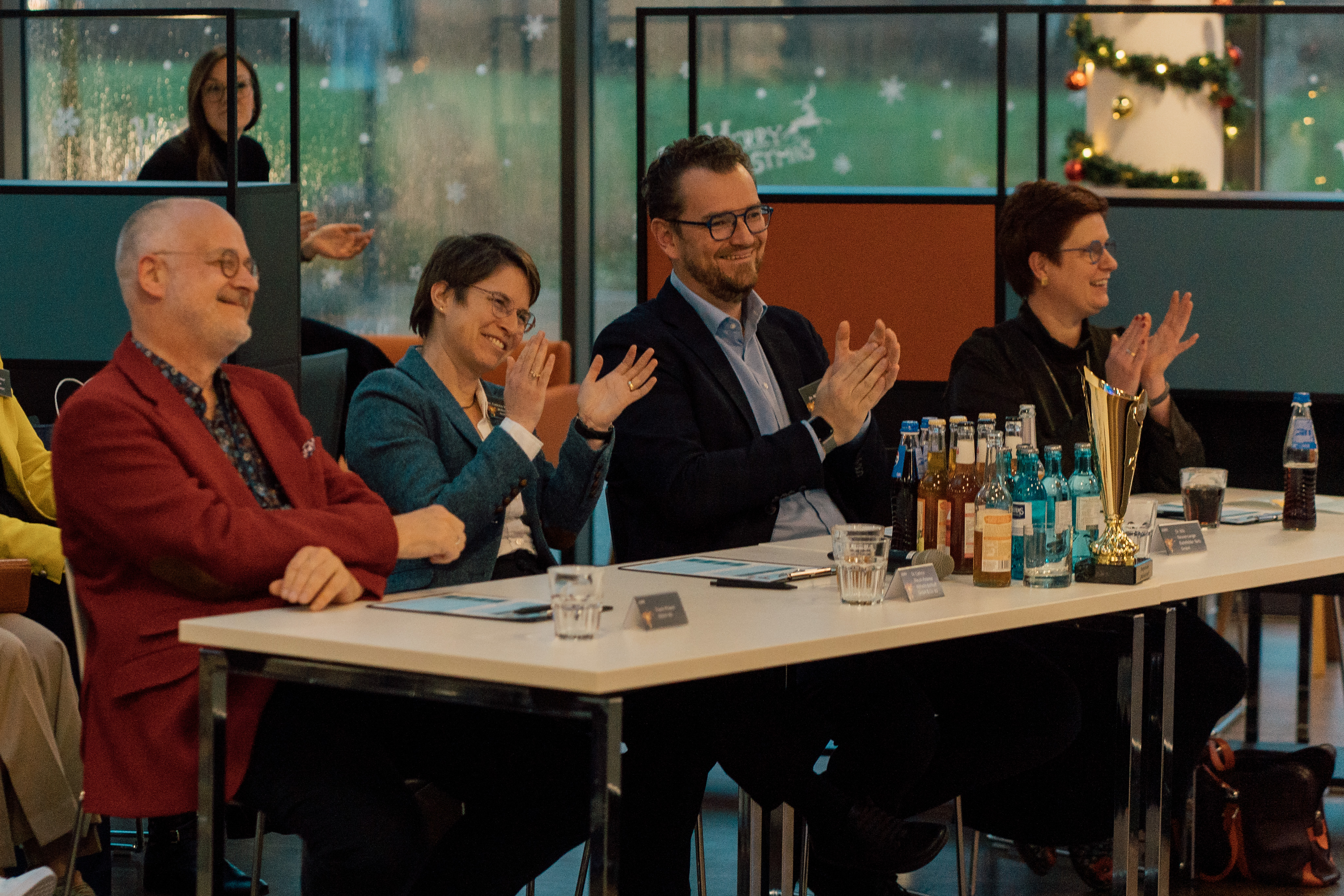 The judging panel applauding a pitch